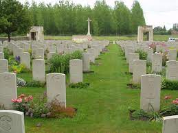 Rows of gravestones in St Vaast Post Military Cemetery