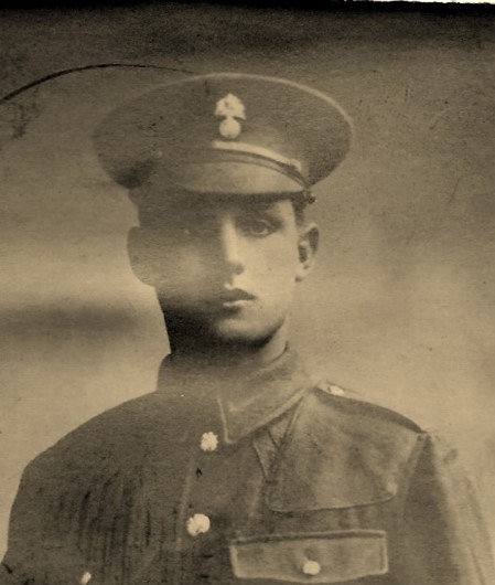 sepia photograph of Ernest in his army uniform and wearing his cap