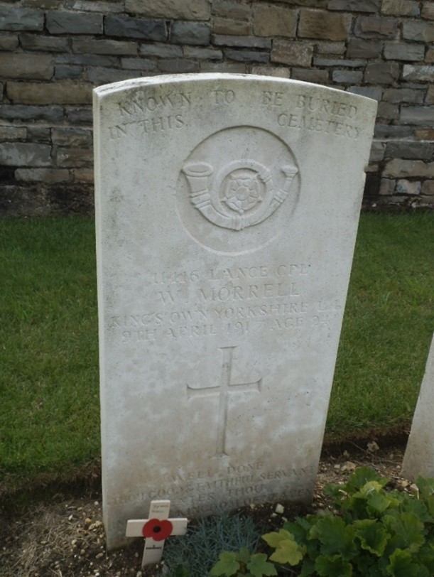 His gravestone. at the top it reads known to be buried in this cemetery and underneath there is his regimental badge, his details and at the bottom the inscription reads well done thou good and faithful servant enter thou the kingdom of heaven