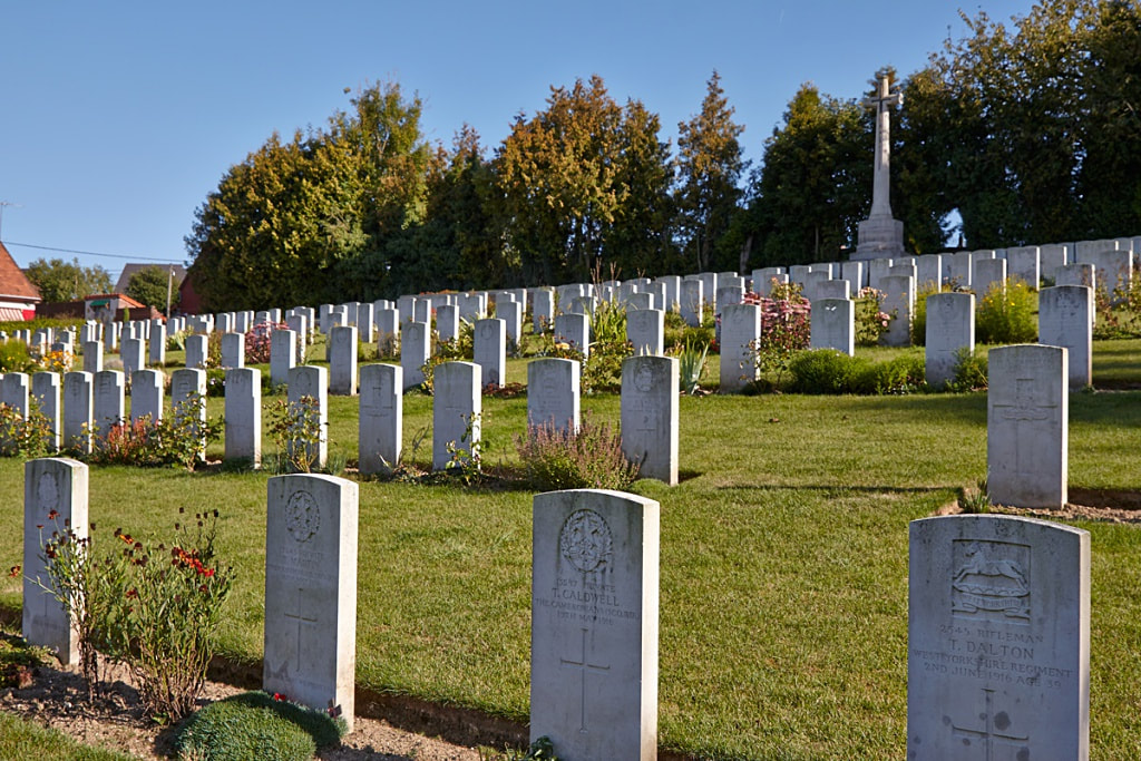 Aveluy Communal Cemetery Extension with rows of gravestones on the hillside
