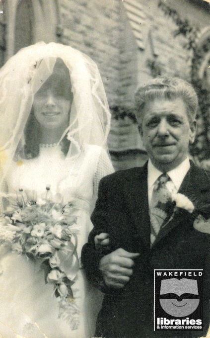 A black and white photograph of the wedding of Miss Dorothy Sturgeon. She is pictured with her father Alfred Hall Sturgeon. Internal Ref: Private collection
