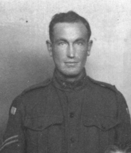 head and shoulders photograph of him wearing his uniform