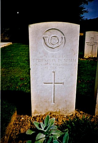 Tom Priestley's headstone which reads No 16764 Sergeant T Priestley DCM and MM. 8th Kings own Yorkshire light infantry killed 1st july 1916