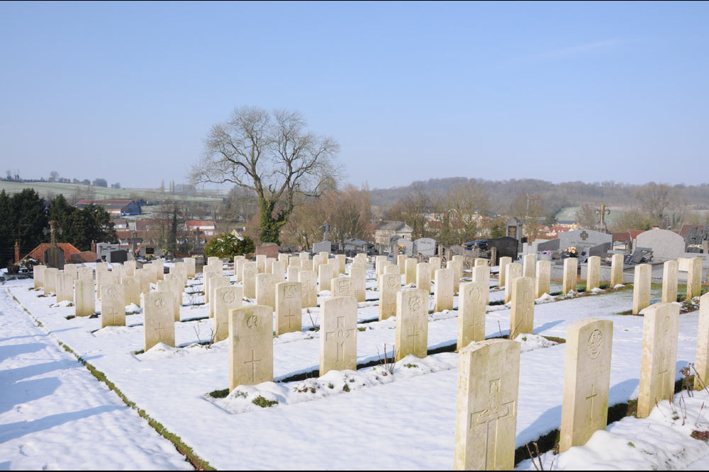 St Hilaire Cemetery Frevent with rows of gravestones in the snow