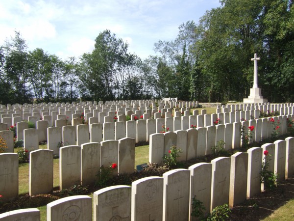 Villers-Faucon Communal Cemetery showing rows of gravestones